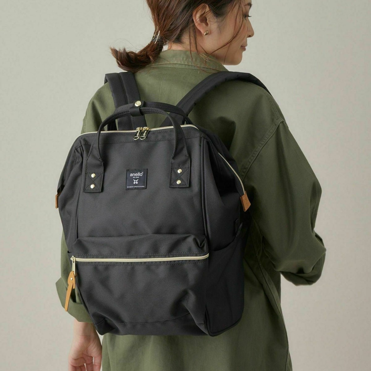 Anello Cross Bottle Backpack Regular in Black - Getoutside Shoes