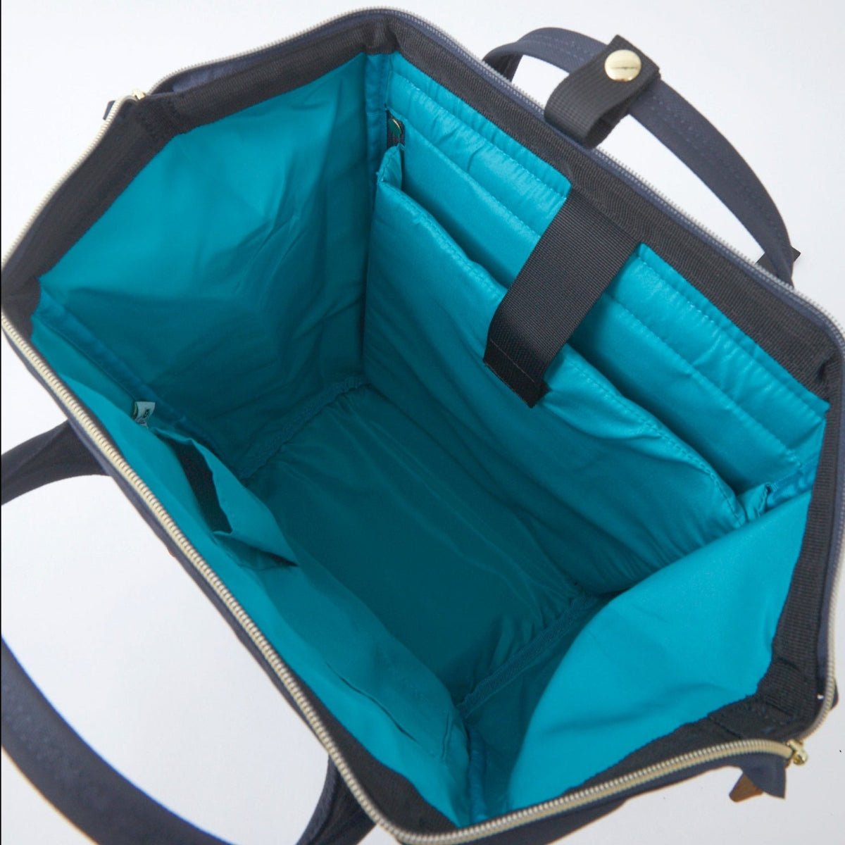 Anello Cross Bottle Backpack Regular in Navy - Getoutside Shoes